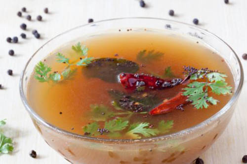 South Indian hot and Sour soup made from tamarind, tomato, cilantro and spices