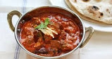 Lamb and potatoes cooked in a very hot and tangy Goan sauce